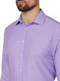 Purple patterned dress shirt worn by a person on a white background