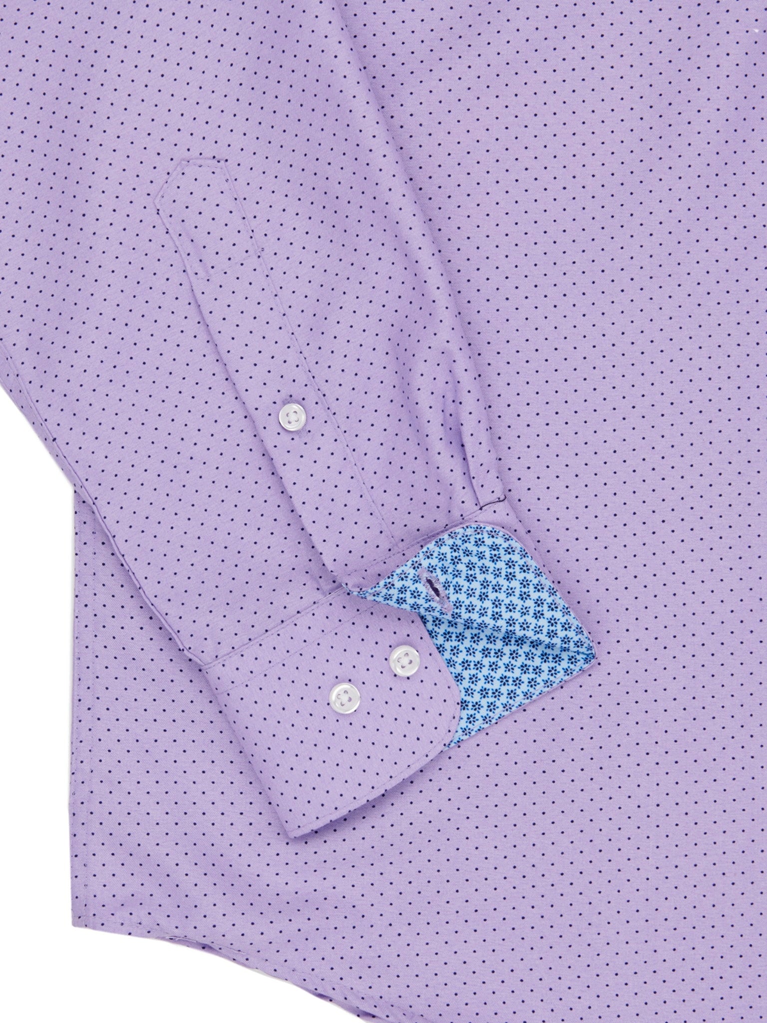 Close-up of a purple shirt with patterned cuffs on a matching background