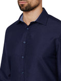 Navy blue patterned shirt worn by a person on a white background