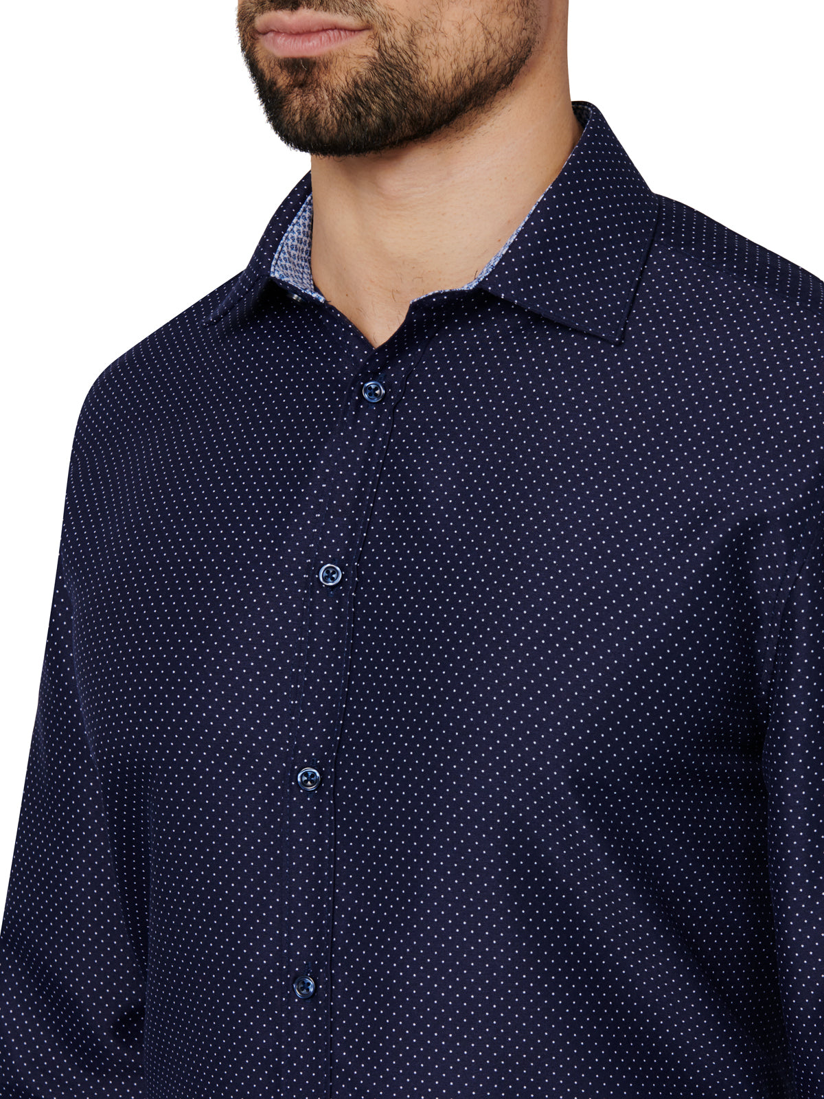 Navy blue patterned shirt worn by a person on a white background