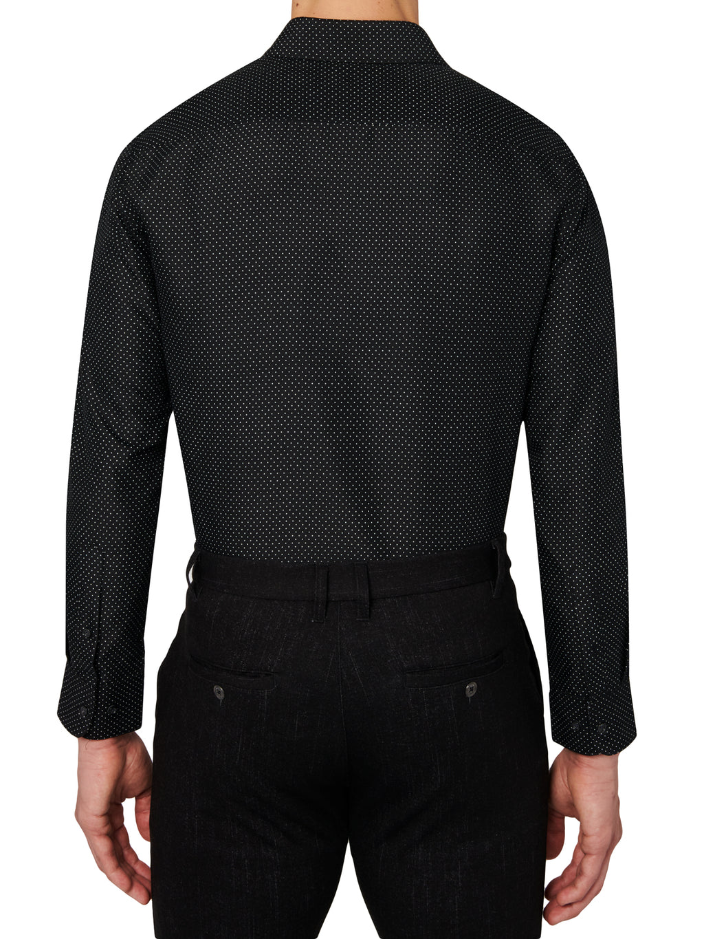 Black patterned shirt worn by a person on a white background