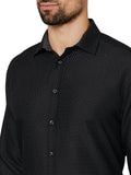 Black patterned shirt worn by a person on a white background