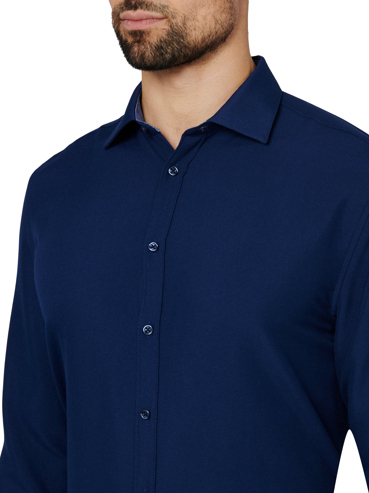 Navy blue button-up shirt worn by a person on a white background