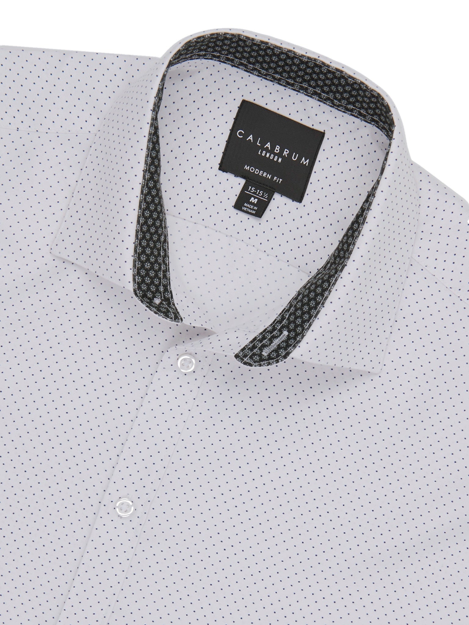 White shirt with black patterned collar and Calbrum label on a white background