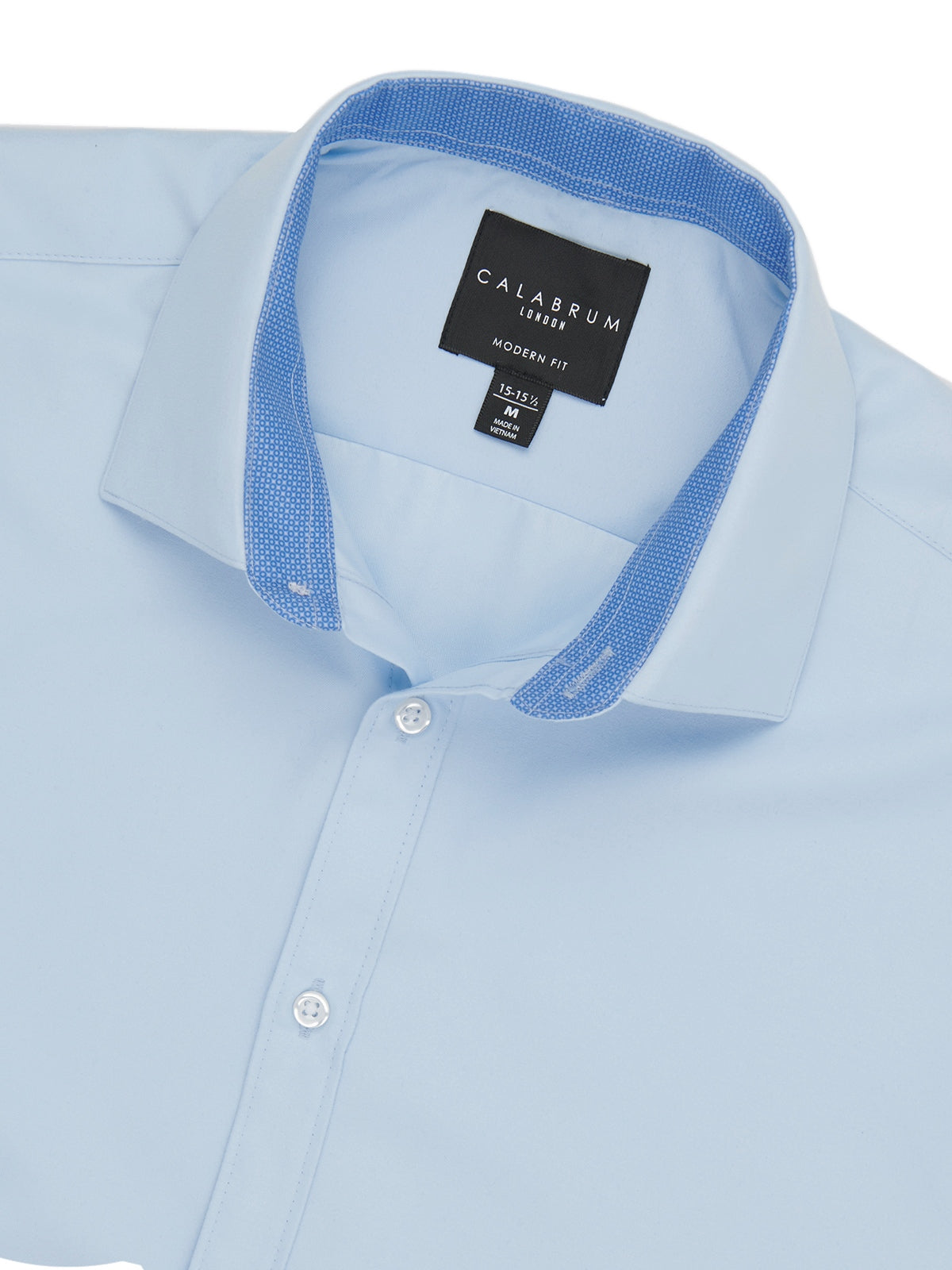 Light blue dress shirt with a visible Calabrum label on a white background