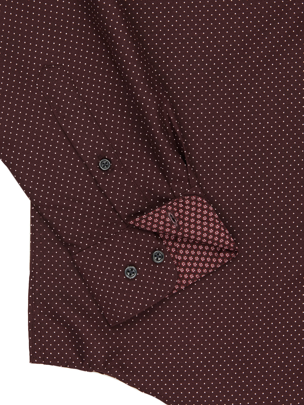 Close-up of a patterned shirt with a pocket detail on a white background