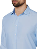 Light blue patterned shirt worn by a person on a white background