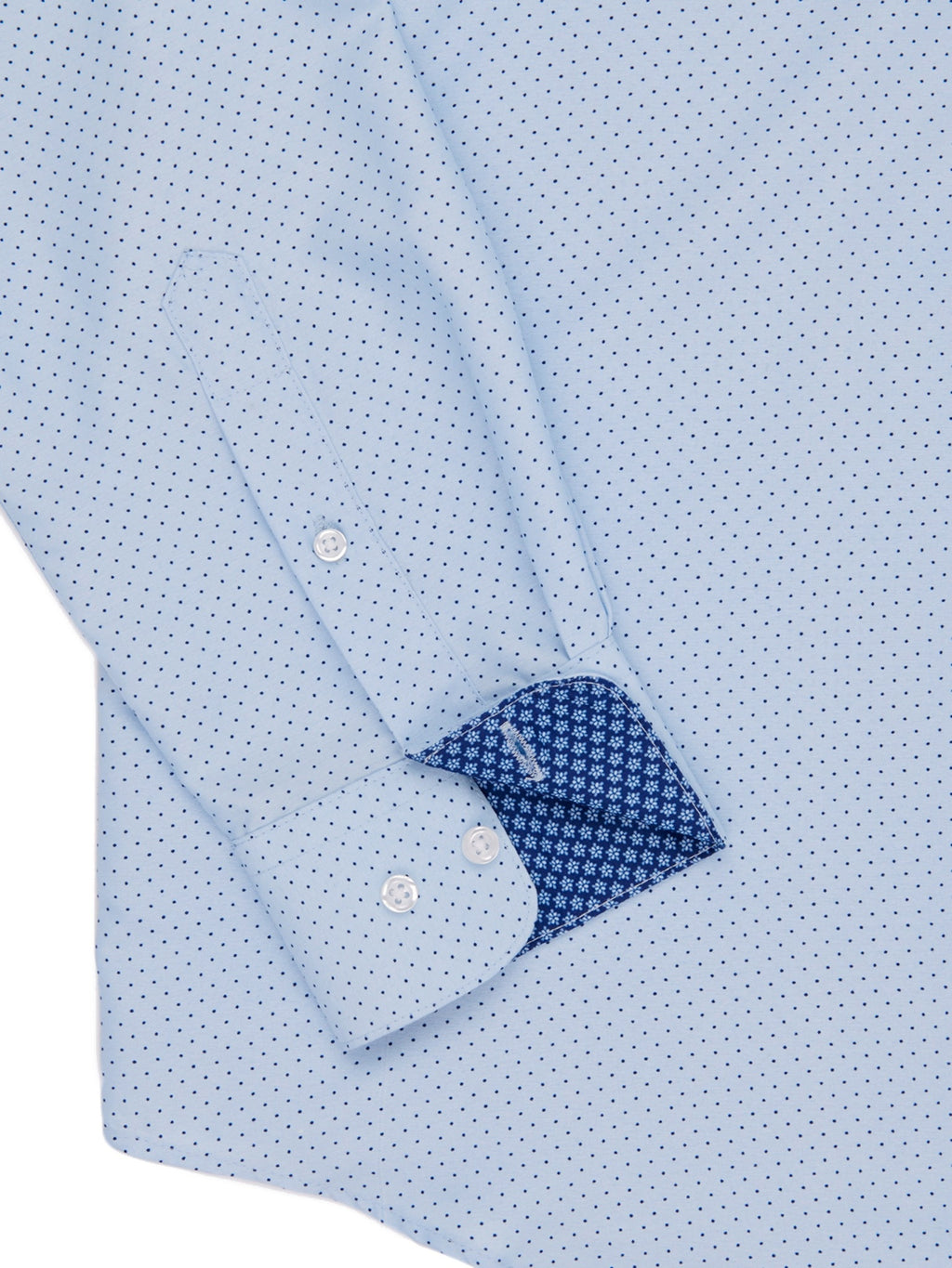 Close-up of a light blue shirt with a subtle pattern on a white background