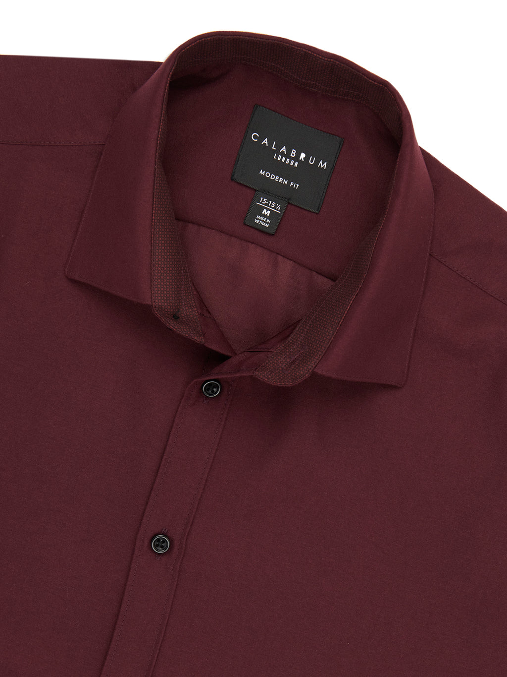 Maroon shirt with a Caliber 1881 label on a white background
