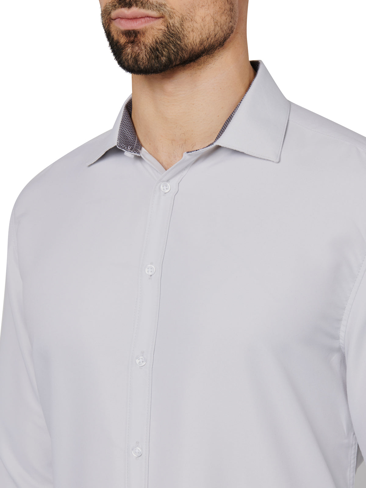 Light gray dress shirt worn by a person on a white background